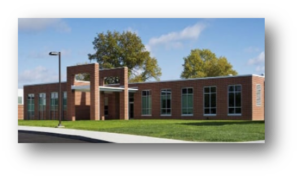 Modern one story brick building with large windows.